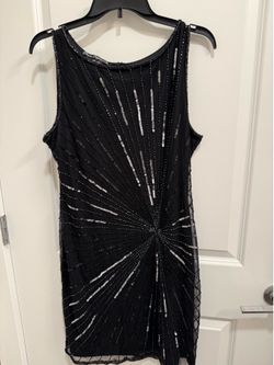 Black Pisarro Nights beaded sleeveless gown featuring a radiating starburst pattern-14p