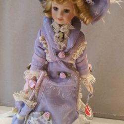 Doll Dressed In Lavender Long Dress.