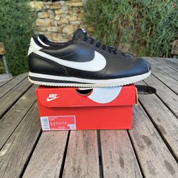 Men’s black and white Nike Cortez’s