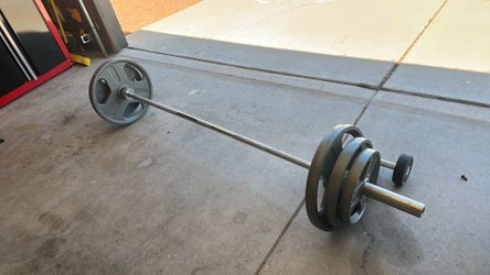 Barbell  and Plates -210 lbs.