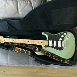 Fender Stratocaster Electric Guitar, Mexican made, Sage Green with Fender Strap.