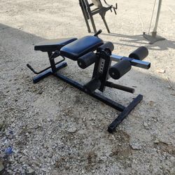 plate-loaded leg extension and leg curl combo machine