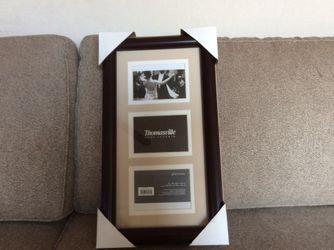 Thomasville Brand New Photo Frame. Holds Three 8 in by 16 in Photos. Mahogany Wood.for $20