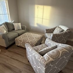 Love Seat, Two Patterned Chairs and matching Ottoman 
