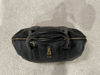 Christian Siriano couch and bag $10 for clutch and 20 for bag. $25 if buy both both plus free gray bag