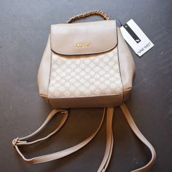 Nine West small backpack purse featuring a monogram pattern and gold-tone hardware. 