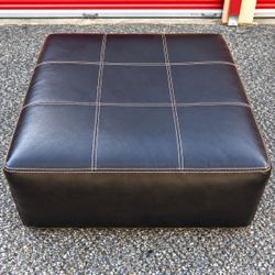 49 inch spinning leather seat and matching Ottoman