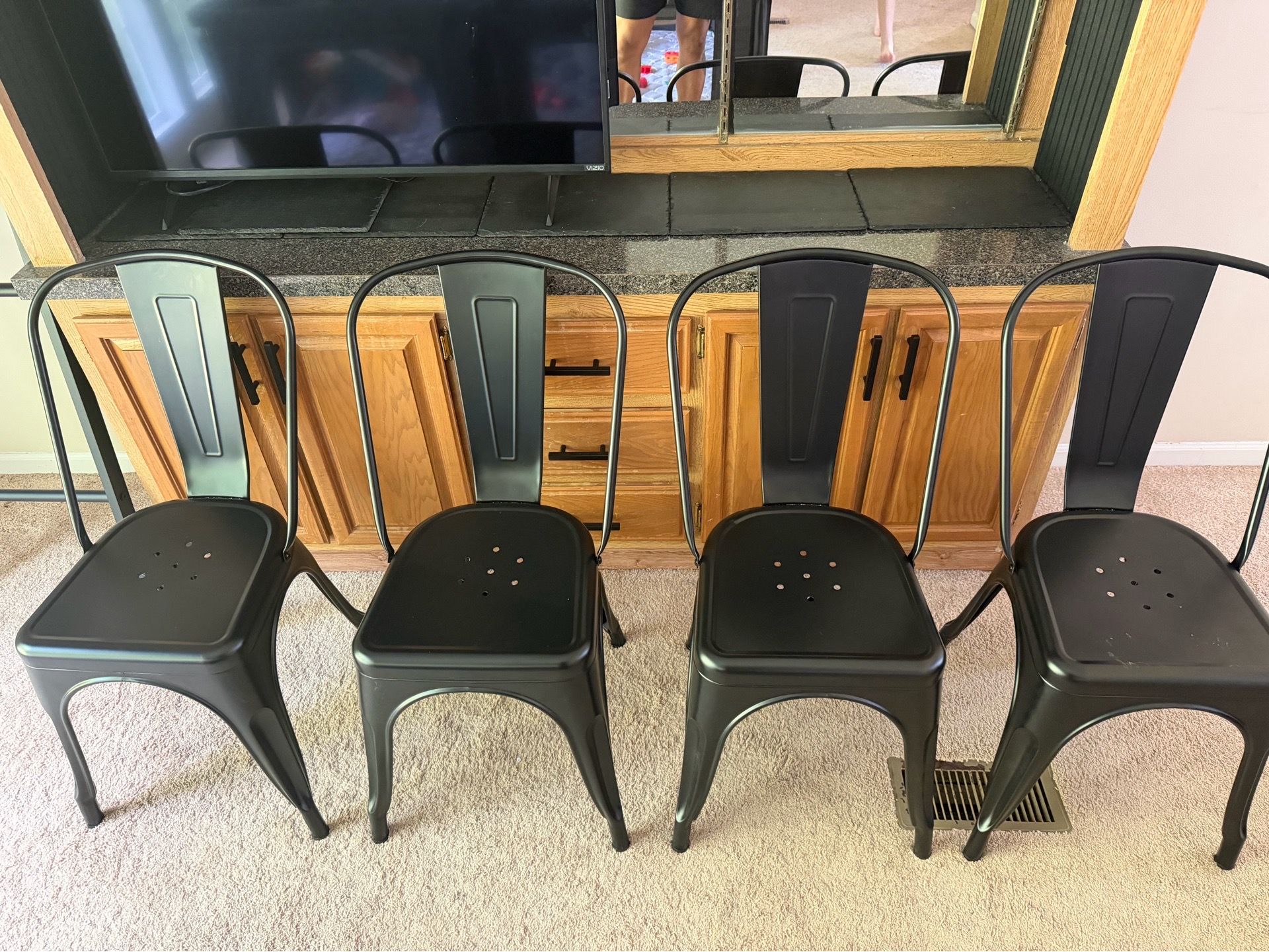 4 black chairs