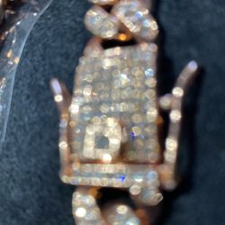 Rare red rose gold unisex bracelet gently used missing one stone