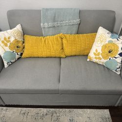 Large Gray Love Seat Turns Into Bed