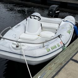 Dinghy: 11.5 Foot RHIB with 30hp Outboard