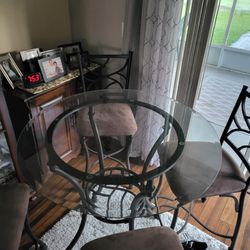 Bistro Table And 2 Wicker Chaira