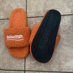 Orange Balenciaga slides