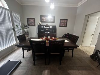 Table and chairs with matching hutch