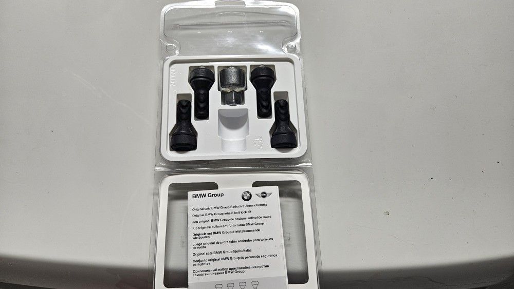 BMW OEM LOCKING WHEEL LUG NUT SET (contact info removed)1
