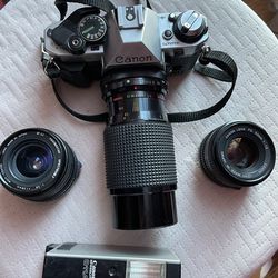 Canon AE-1 35mm SLR film camera with Lenses