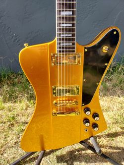 Gold firebird inspired electric guitar new
