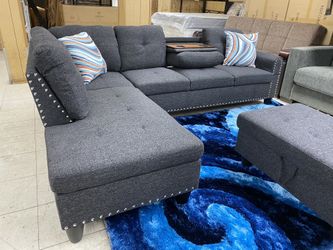 Grey sectional with cup holders