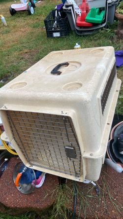 Dog kennel size length 26 w 21 height 20. Price 19$. Pick up. E.  Side  72 and   Grand view   E. Tacoma