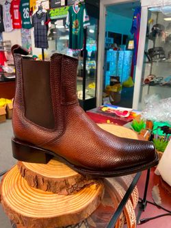 Botines de piel con cierre para hombre