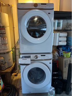 2 years old Samsung front-load washer and electric dryer with cords, stacking kit, hoses