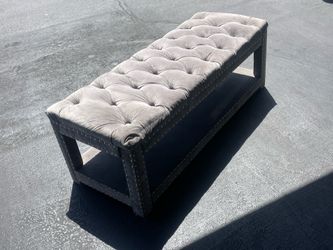 Gray velvet bench