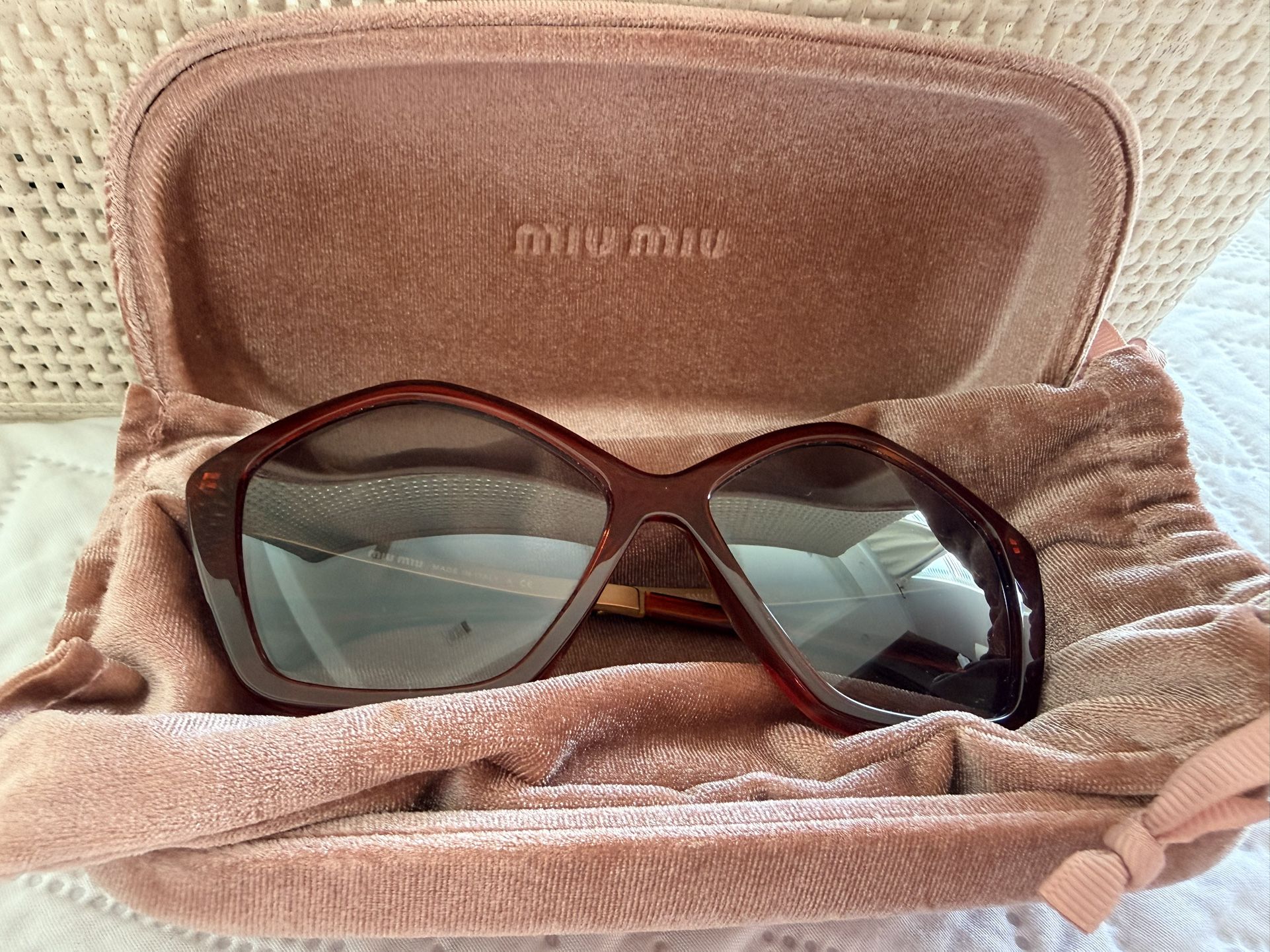 Miu Miu. Sunglasses