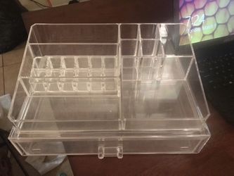 Nail polish, brushes, and makeup caddy
