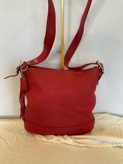 Coach F03790 red pebbled leather duffle shoulder bag, tassel hang tag