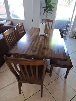 Table with bench and 4 chairs