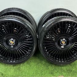 New 26 inch gloss black wheels with cadillac floating caps and atturo 305/30r26 tires