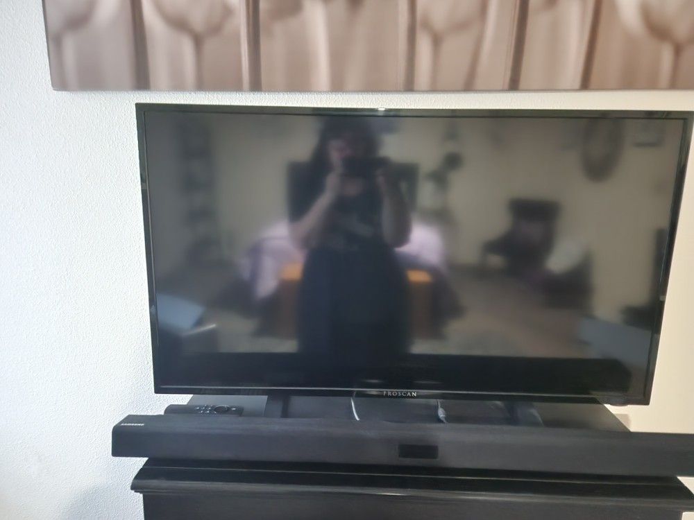 TV and Sound Bar and Speaker
