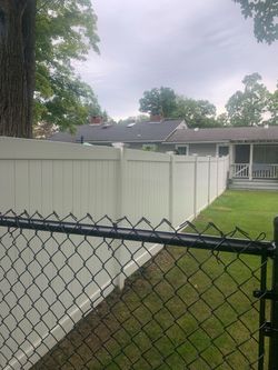 100 feet of 6 foot privacy vinyl fence and 100 feet of 5 foot chain-link black vinyl with a 5 foot gate 100 feet of 6 foot privacy vinyl fence and 100