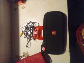 Nintendo switch case and a baby toy
