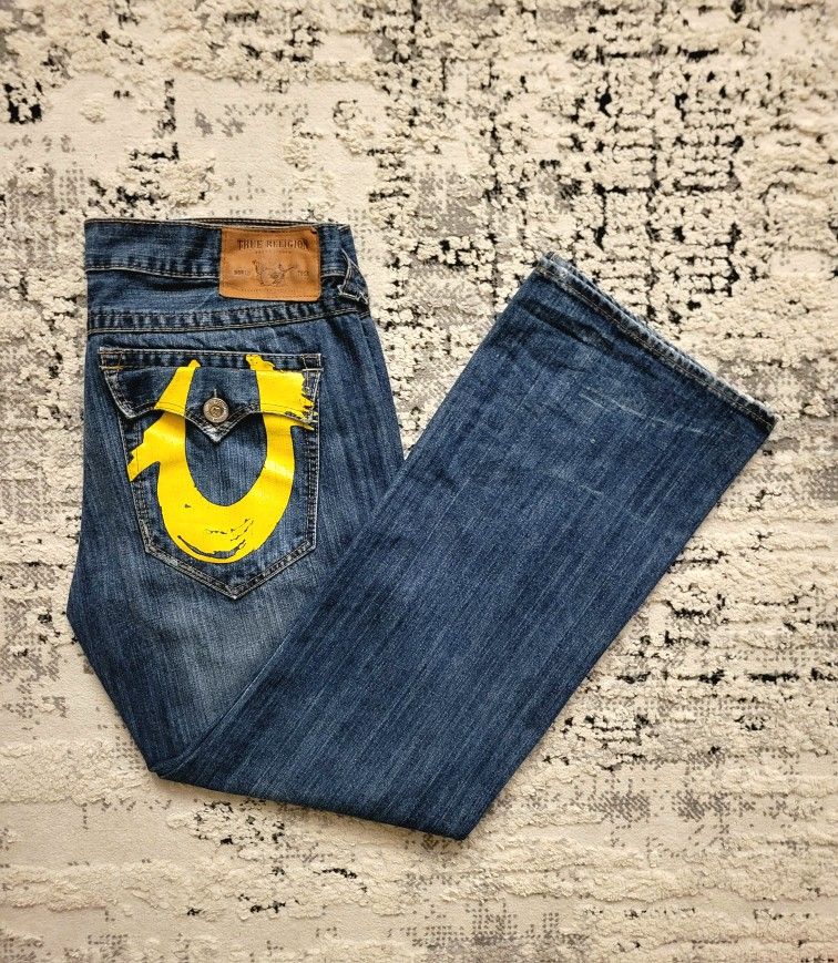 TRUE RELGION BAGGY YELLOW HORSE SHOE JEANS