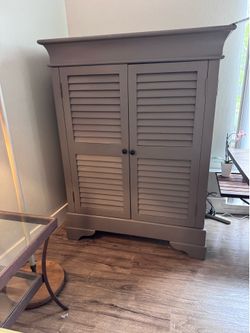 Cabinet for TV, bar, general storage.