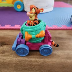 Vintage push Tigger down and go toy car