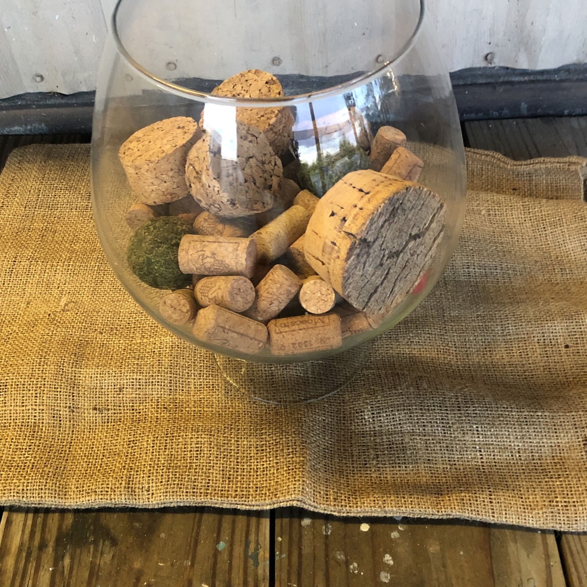 Glass Jar 1/2 Full Of Corks Of All Sizes