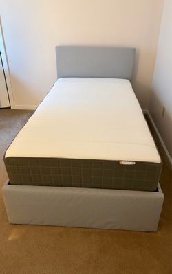 Twin bed IKEA mattress and under bed storage