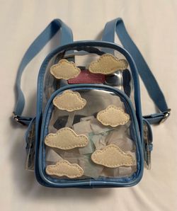 Dollskill Sugat Thrillz transparent mini backpack with white clouds
