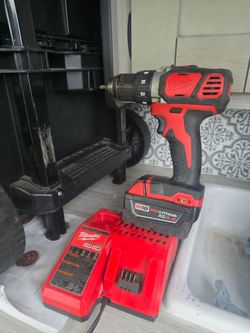 Milwaukee  drill and charger