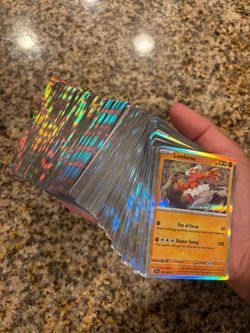 Pokemon card holos plus a bunch of old promos