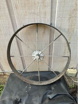 $45- Antique iron wheel