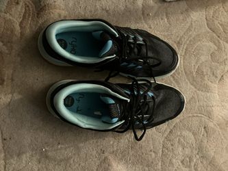 Size 71/2 Black And Blue Tennis Shoes