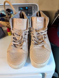 Vans with the zip up backs. Size 10.5