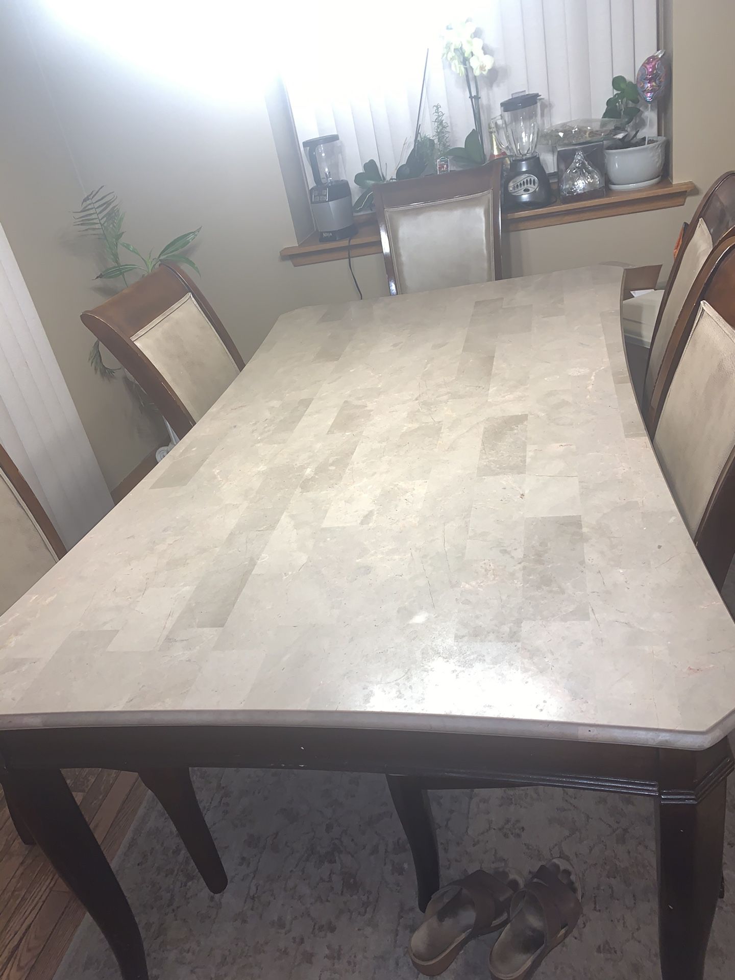 7 piece granite top dining set with leather and wood chairs