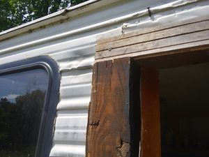 Photo 26 ft long 8 ft wide camper with great potential it needs some floors and walls its a fixee uper I want $500 I would be willing trade