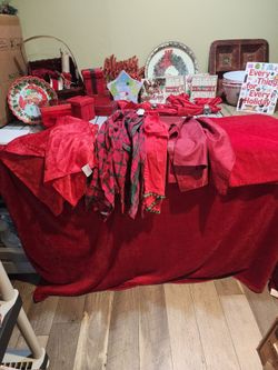 Christmas decorations a all kinds. Place mats, napkins, pictures to much to add.