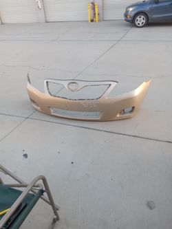 10 to 11 front bumper toyota camry ( oem)