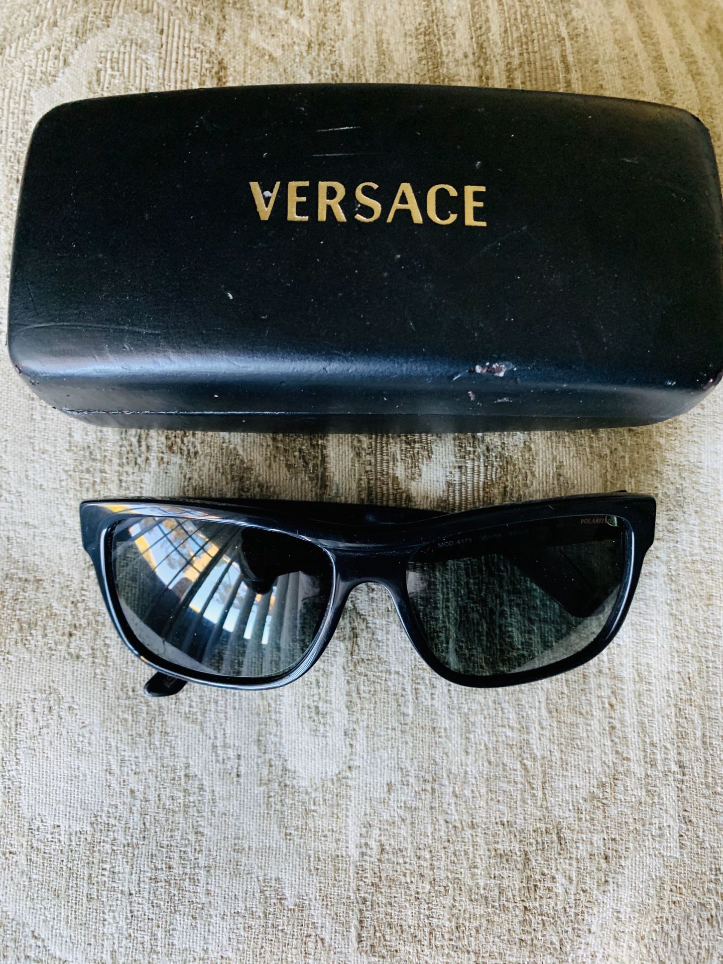 Versace men’s polarized sunglasses model: 4179 for $75